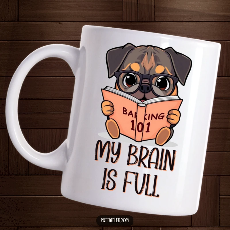 Funny mug with a bespectacled Rottweiler intently reading a huge book titled Barking 101, showcasing its academic passion.