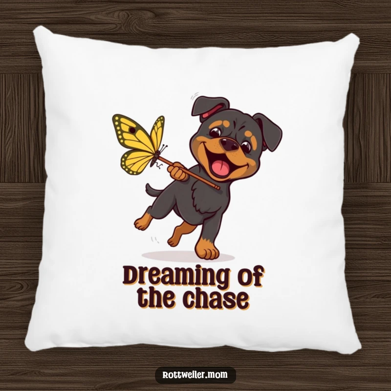 Funny Rottweiler Butterfly Pillow shows an excited dog with a net, chasing a huge butterfly, offering humorous comfort and dynamic style.
