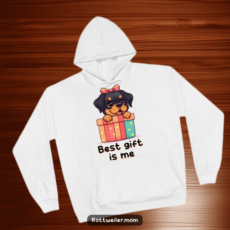 Funny Rottweiler Gift Box Hoodie: A cozy hoodie featuring an excited rottweiler behind a gift box, full of joy.