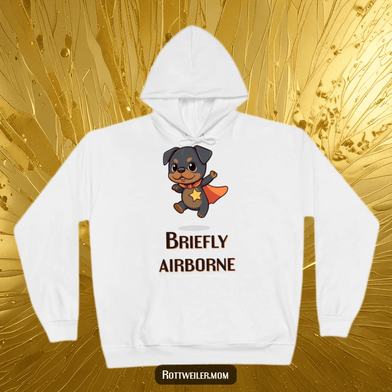 Funny Kawaii Rottweiler Hoodie showing a cute dog wearing a superhero cape, flying a short distance with confidence.