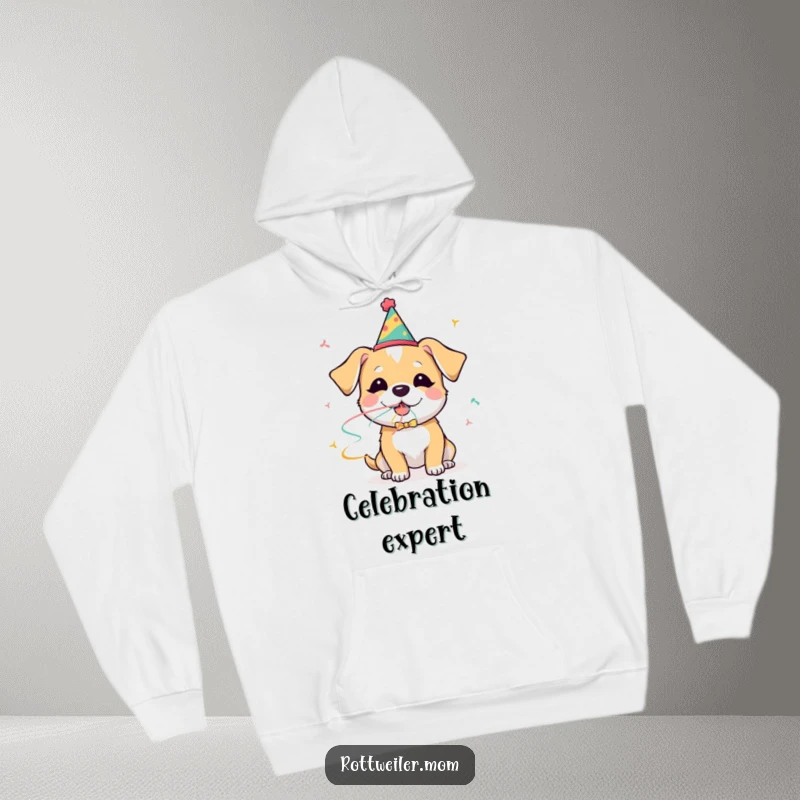 Funny dog hoodie showing a dog in a party hat happily blowing a streamer, perfect for staying warm and celebrating.
