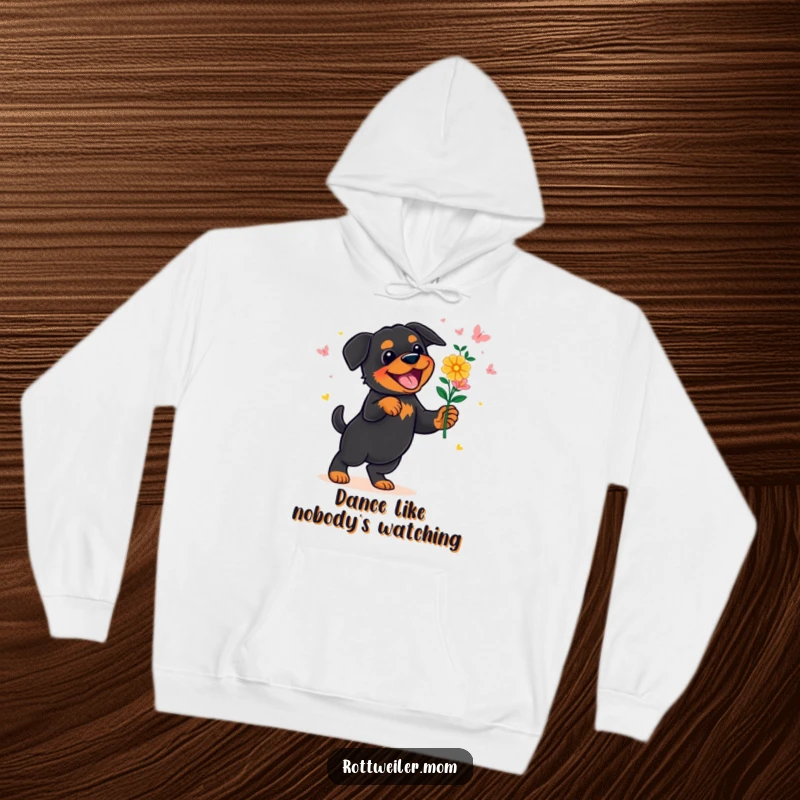 Funny Rottweiler Hoodie: A joyful Rottweiler performs a lively dance holding a beautiful bouquet of flowers, guaranteed to bring smiles.