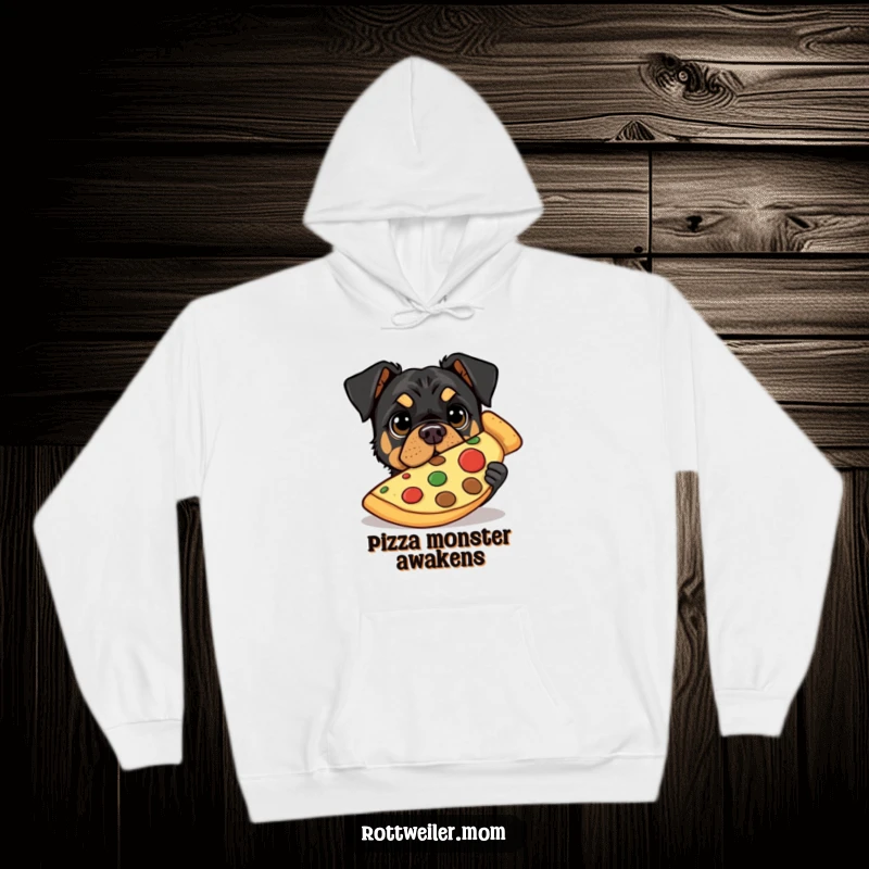 Funny hoodie showcasing a Rottweiler peeking from behind a large pizza slice with wide, captivating eyes.