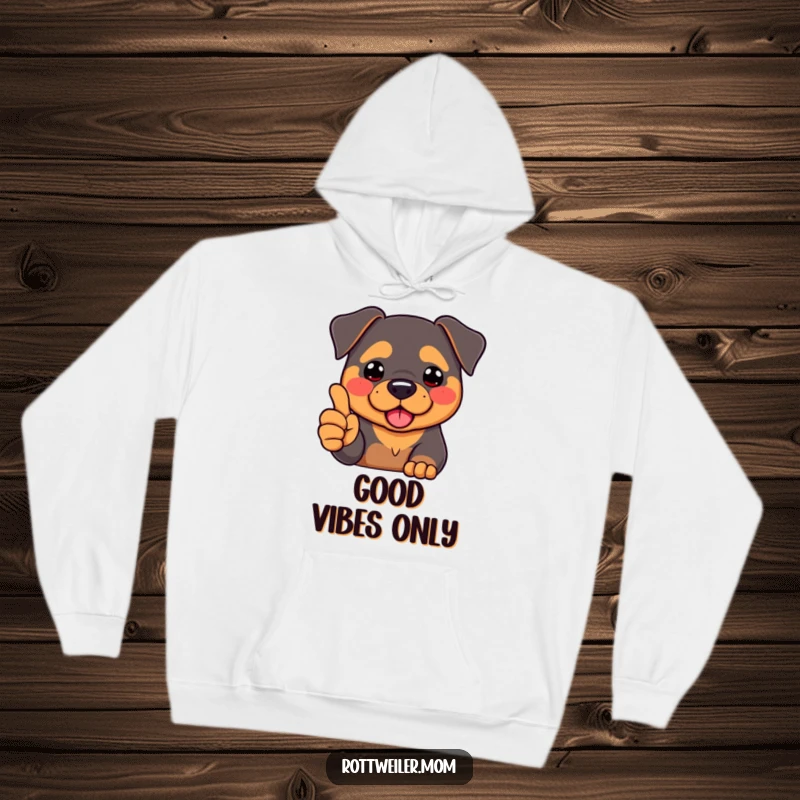 Funny Kawaii Rottweiler, with rosy cheeks, giving a thumbs-up with its paw, printed on a warm and cozy hoodie.