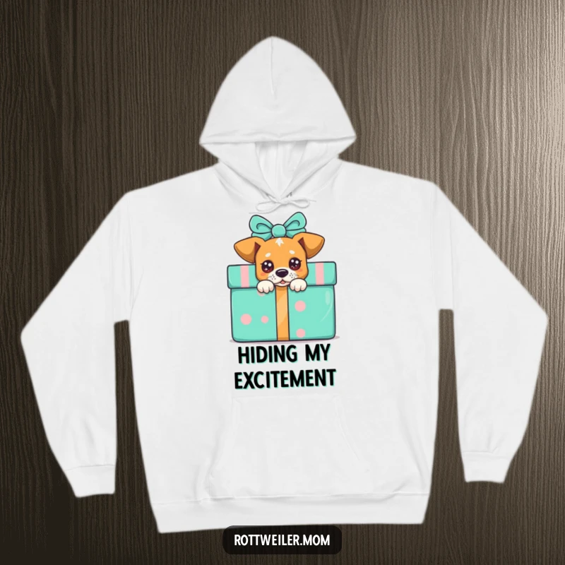 Funny peek-a-boo dog hoodie, a dog with sparkling eyes peeking from behind a large, colorful gift, exuding curiosity.