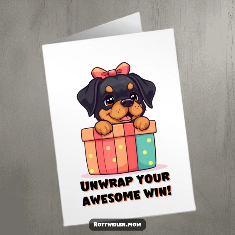 Funny free printable congratulations card: a rottweiler pops out from behind a huge colorful gift box, celebrating success.