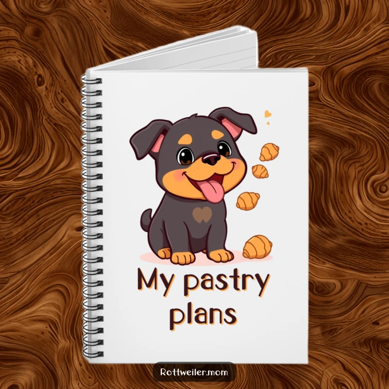 Funny Kawaii Rottweiler juggling croissants on a notebook cover, adding a touch of culinary humor.