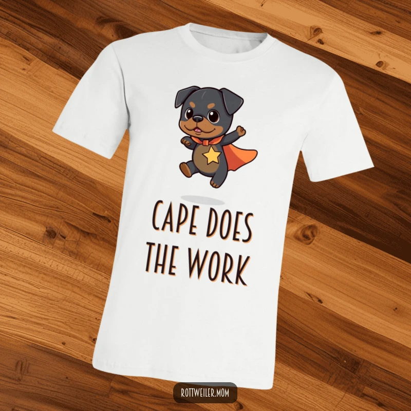 Funny Kawaii Rottweiler T-Shirt featuring a cute dog in a superhero cape, flying a short distance with a joyful expression.